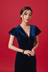 Velvet midi dress with V-neckline, flutter sleeves, and front button embellishment